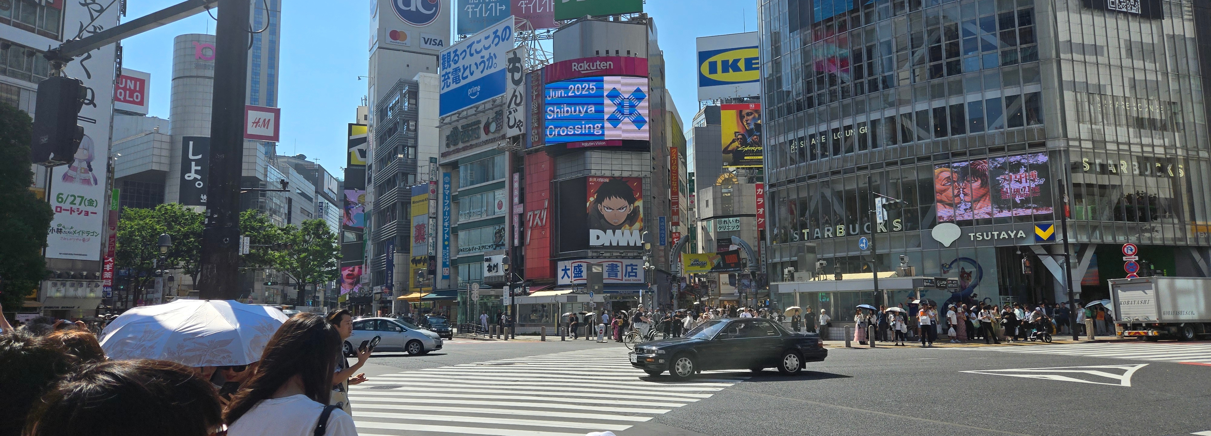 A mood banner showing a view of Shibuya Scramble in Summer.